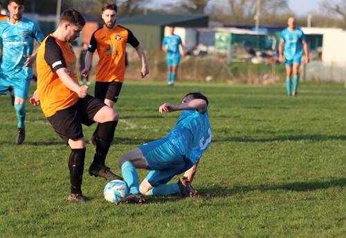 Tenby's Sam Butler and Johnston's Lewis Boswell challenge for the ball