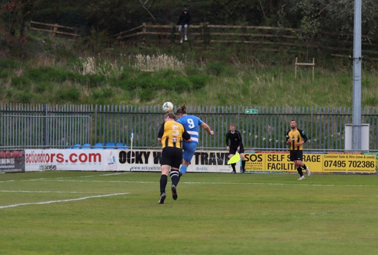 Chalmers heads in the opening goal for Camrose after an excellent cross